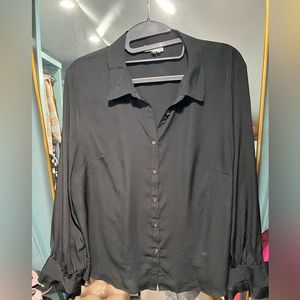 Beautiful silk blouse with ruffle sleeve detail